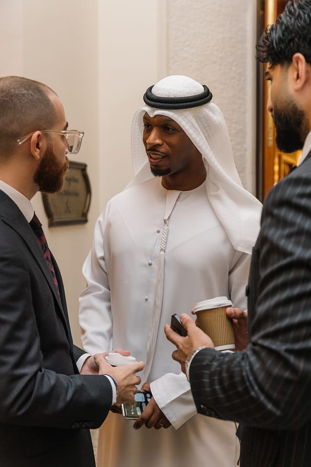 Attendees networking and engaging at The Syndicate Global luxury event in Dubai